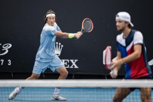 必发官网-张之臻打入男双四强，战术对头痛打双打专家